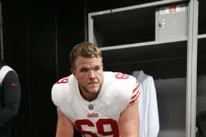 San Francisco 49ers Offensive Lineman Mike Mcglinchey In Action Wallpaper