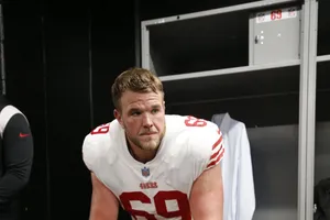 San Francisco 49ers Offensive Lineman Mike Mcglinchey In Action Wallpaper