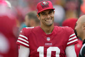 San Francisco 49ers Quarterback Jimmy Garoppolo In Action Wallpaper