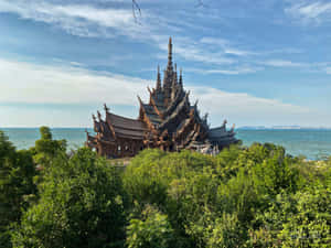 Sanctuary Of Truth Poking Out From The Forest Wallpaper