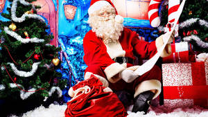 Santa Claus Reading Long List Wallpaper