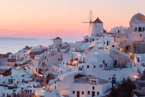 Santorini Sunset Glow Wallpaper