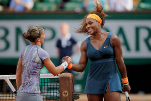 Sara Errani Clasping Hands With Opponent Wallpaper