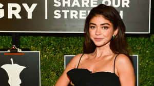 Sarah Hyland Radiating Confidence At An Event Wallpaper