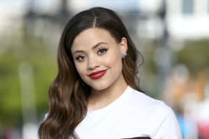 Sarah Jeffery Smiling Portrait Wallpaper