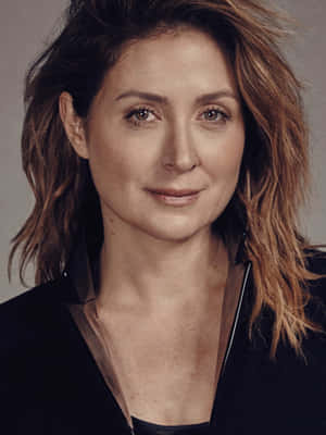 Sasha Alexander Smiling Radiantly Wallpaper