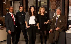 Sasha Alexander Striking A Pose In A Winter Fashion Outfit Wallpaper