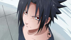 Sasuke Uchiha With The Cursed Mark Unleashed Wallpaper