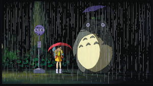 Satsuki And Mei Embrace Totoro Under The Sheltering Boughs Of A Magical Tree During A Rainstorm. Wallpaper