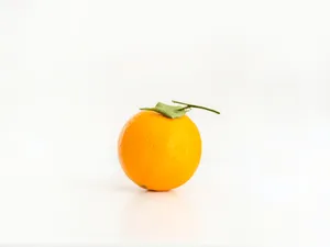 Satsuma Mandarin On White Background Wallpaper