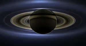 Saturn Passing Through Its Rings Wallpaper