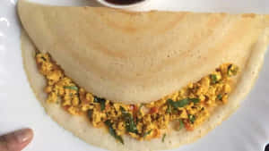 Savory And Crispy South Indian Delight - Dosa Wallpaper