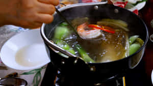 Savory Boiling Broth For Shabu-shabu Wallpaper