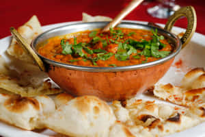 Savory Chicken Tikka Masala - Traditional Indian Cuisine Wallpaper