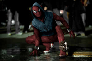 Scarlet Spider Crouchingon Street Night Wallpaper