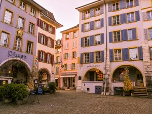 Scenic View Of Biel/bienne Cityscape Against The Backdrop Of Jura Mountains Wallpaper