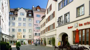 Scenic View Of Chur, The Oldest Town In Switzerland, Overlooking The Snow-capped Alpine Peaks At Sunset Wallpaper