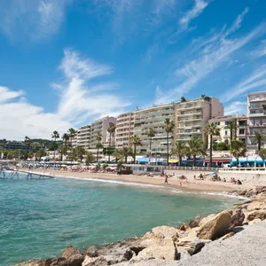 Scenic View Of French Beach On A Sunny Day Wallpaper