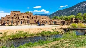 Scenic View Of Rio Pueblo Flowing Through The Ancient Taos Pueblo. Wallpaper