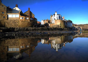 Scenic View Of Robin Hood's Bay In Yorkshire Wallpaper