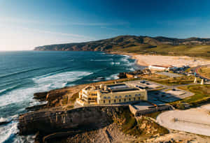 Scenic View Of The Picturesque Portuguese Beach Wallpaper