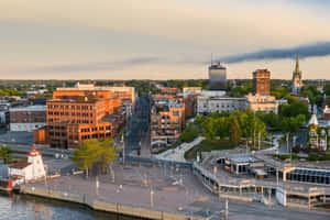 Scenic View Of Trois-rivieres Cityscape At Sunset Wallpaper