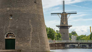 Schiedam Windmill By The Canal Wallpaper