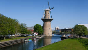 Schiedam Windmill By The Canal Wallpaper