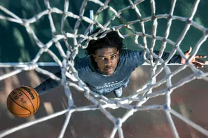 Scoot Henderson Showing Off His Breathtaking Basketball Skills Wallpaper