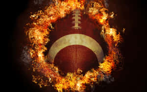 Scorch The Field With Football On Fire Wallpaper