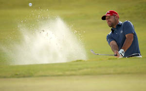 Scott Brown Sending Sand Flying Wallpaper