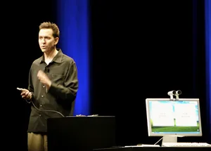 Scott Forstall Giving A Demo Wallpaper
