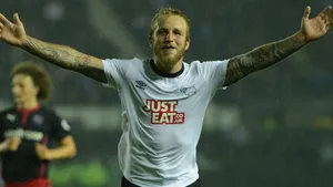 Scottish Professional Football Player Johnny Russell On Field Wallpaper