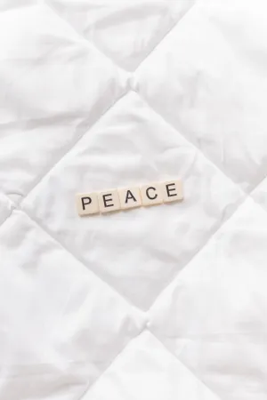 Scrabble Tiles Spelled In Peace Wallpaper