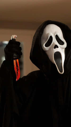 Scream Ghostface Wielding Bloody Knife Wallpaper