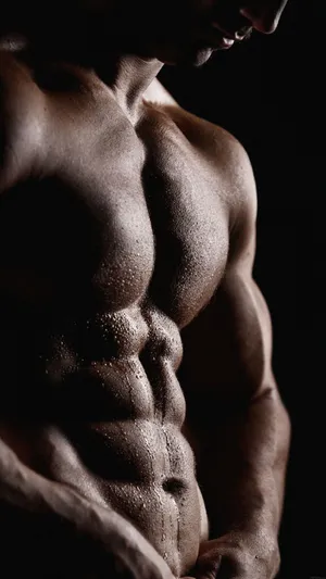 Sculpted Musculaturein Shadow Wallpaper