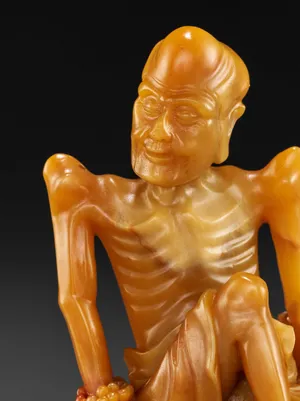 Sculpture Of An Emaciated Old Man Wallpaper