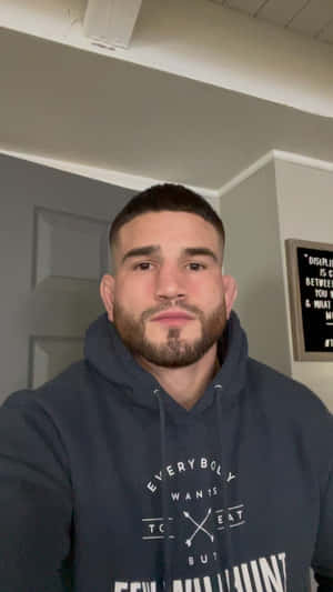 Sean Brady Wearing A Hoodie Wallpaper