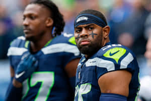 Seattle Seahawks Linebackers Focused During Game Wallpaper