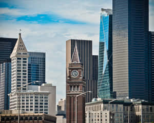 Seattle Skylinewith Historic Clock Tower Wallpaper