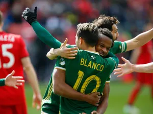 Sebastian Blanco Hugging Larrys Mabiala Wallpaper