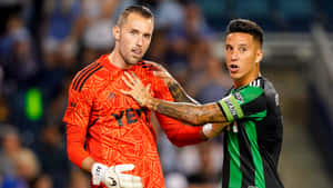 Sebastian Driussi And Goalkeeper Brad Stuver Wallpaper