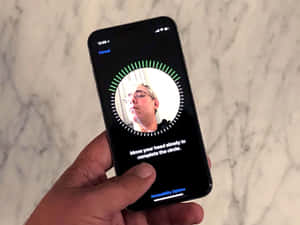 Secure Your Device With Apple's New Face Id Technology Wallpaper