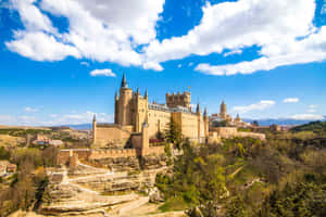 Segovia Castle On Top Rock Formation Wallpaper