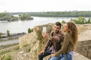 Selfie Man And Woman With Nature Wallpaper