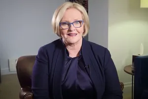 Senator Claire Mccaskill Sitting On An Armchair Wallpaper
