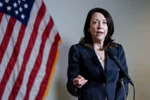 Senator Maria Cantwell Pays Respect To America’s Flag Wallpaper