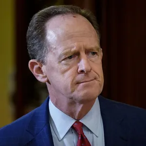 Senator Pat Toomey With A Serious Expression Wallpaper
