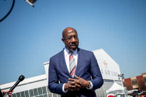 Senator Raphael Warnock At Delta Flight Museum Vaccination Site Wallpaper