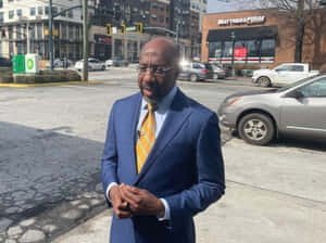 Senator Raphael Warnock In Street Wallpaper